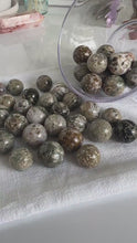 Load and play video in Gallery viewer, Incredible Sea Jasper, also known as Ocean Jasper and orbicular jasper,  mini spheres, Random pull,  mini stand included.
