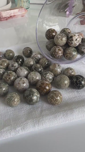 Incredible Sea Jasper, also known as Ocean Jasper and orbicular jasper,  mini spheres, Random pull,  mini stand included.