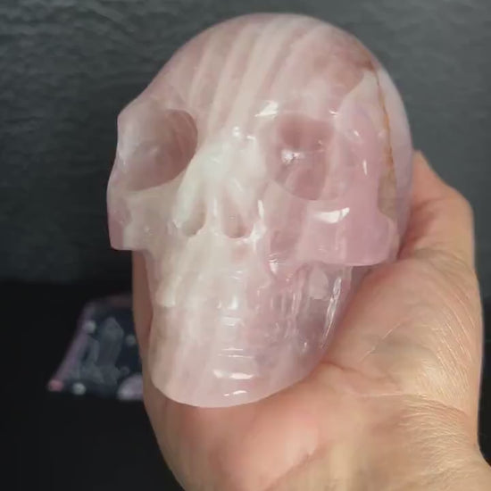 Beautiful Rose Quartz Skull. Approx 4 inches tall and 4 1/2 inches long.  Weighs 2.6 pounds