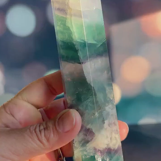 Stunning Rainbow Fluorite with snowflake/feather pattern stands 6 1/2 inches tall weighs approx 1 pound