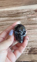 Load and play video in Gallery viewer, Black Onyx Crystal Skull | Stunning Gemstone Skull | Gothic Halloween Decor for lovers of the macabre and esoteric (smokyskull_5)
