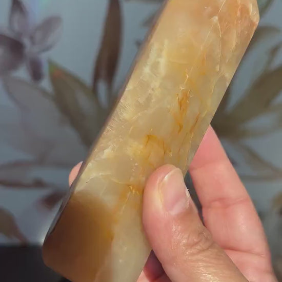 Stunning Peach Moonstone Tower is super flashy on two sides. It stands 5 1/2 inches tall and weighs 12. ounces (PMT-1)