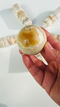 Load image into Gallery viewer, layered Agate Sphere ||  Creme and neutral color Crystal || Beautifully banded || Neutral aesthetic || 2&quot;   6.4 oz
