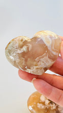 Load image into Gallery viewer, Beautiful flower agate heart carving || 3&quot; 4.8 oz || soft neutral colors with pink and peach colored blossom patterns || .
