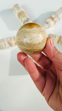 Load image into Gallery viewer, layered Agate Sphere ||  Creme and neutral color Crystal || Beautifully banded || Neutral aesthetic || 2&quot;   6.4 oz
