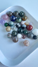 Load image into Gallery viewer, ORIGINAL MINI MIX, 3 oz of random Crystal Minis, Mushrooms, Hearts, Spheres, Moons, Stars, animals, Towers, and Pyramid carvings.
