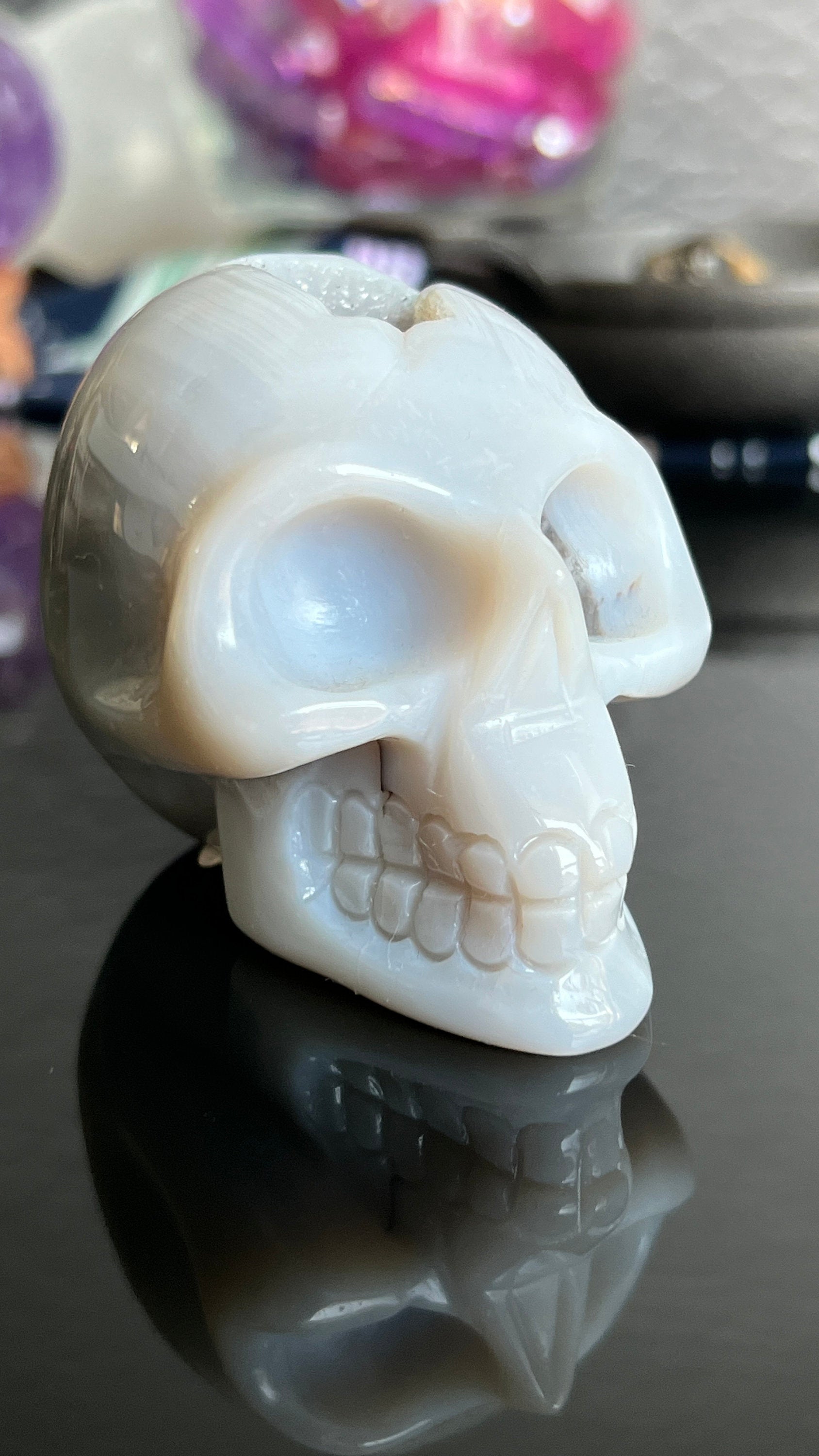 Druzy Banded Agate Skull 2 1/4 inches tall, weighing 9.1 ounces