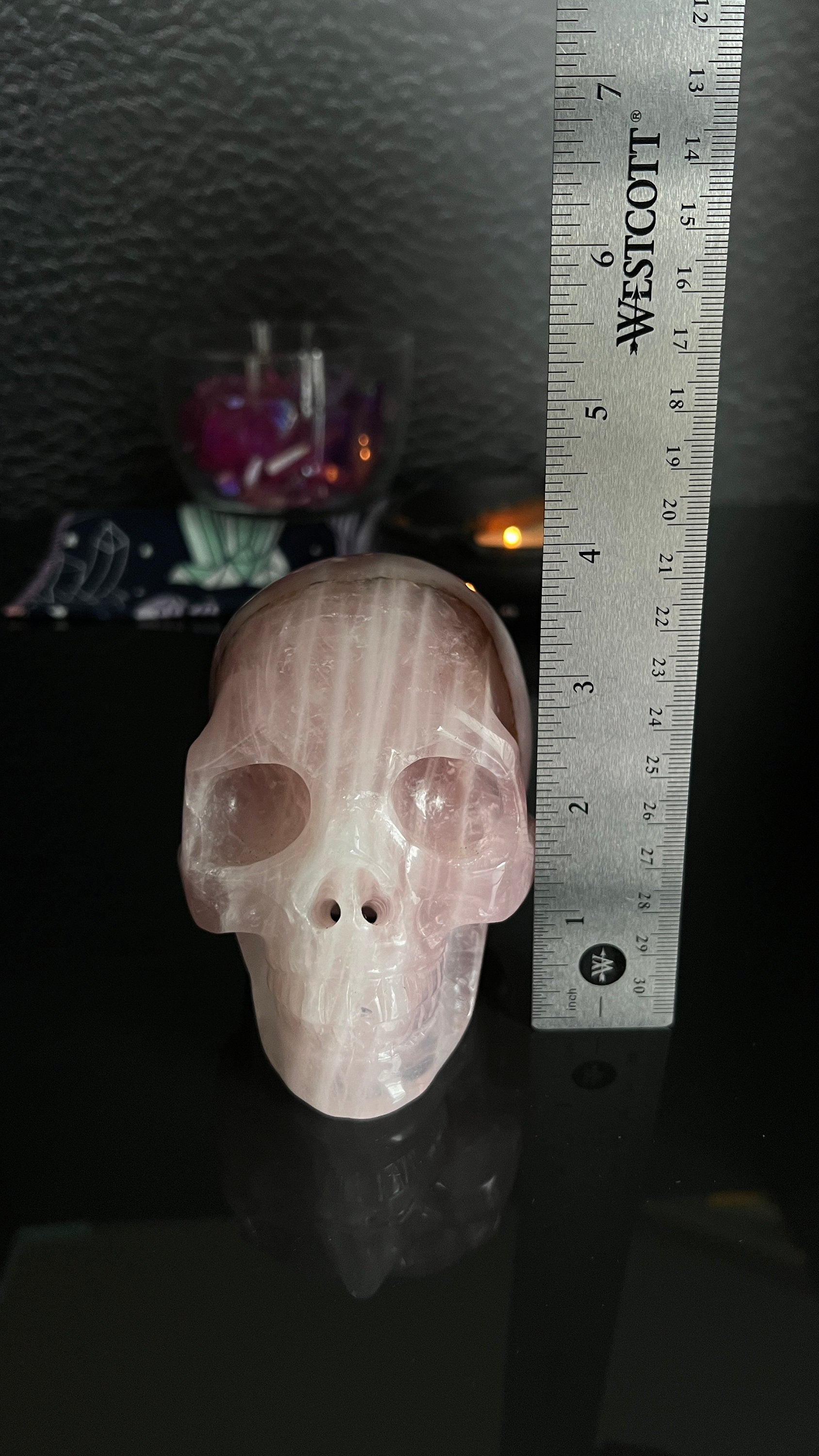 Beautiful Rose Quartz Skull. Approx 4 inches tall and 4 1/2 inches long. Weighs 2.6 pounds