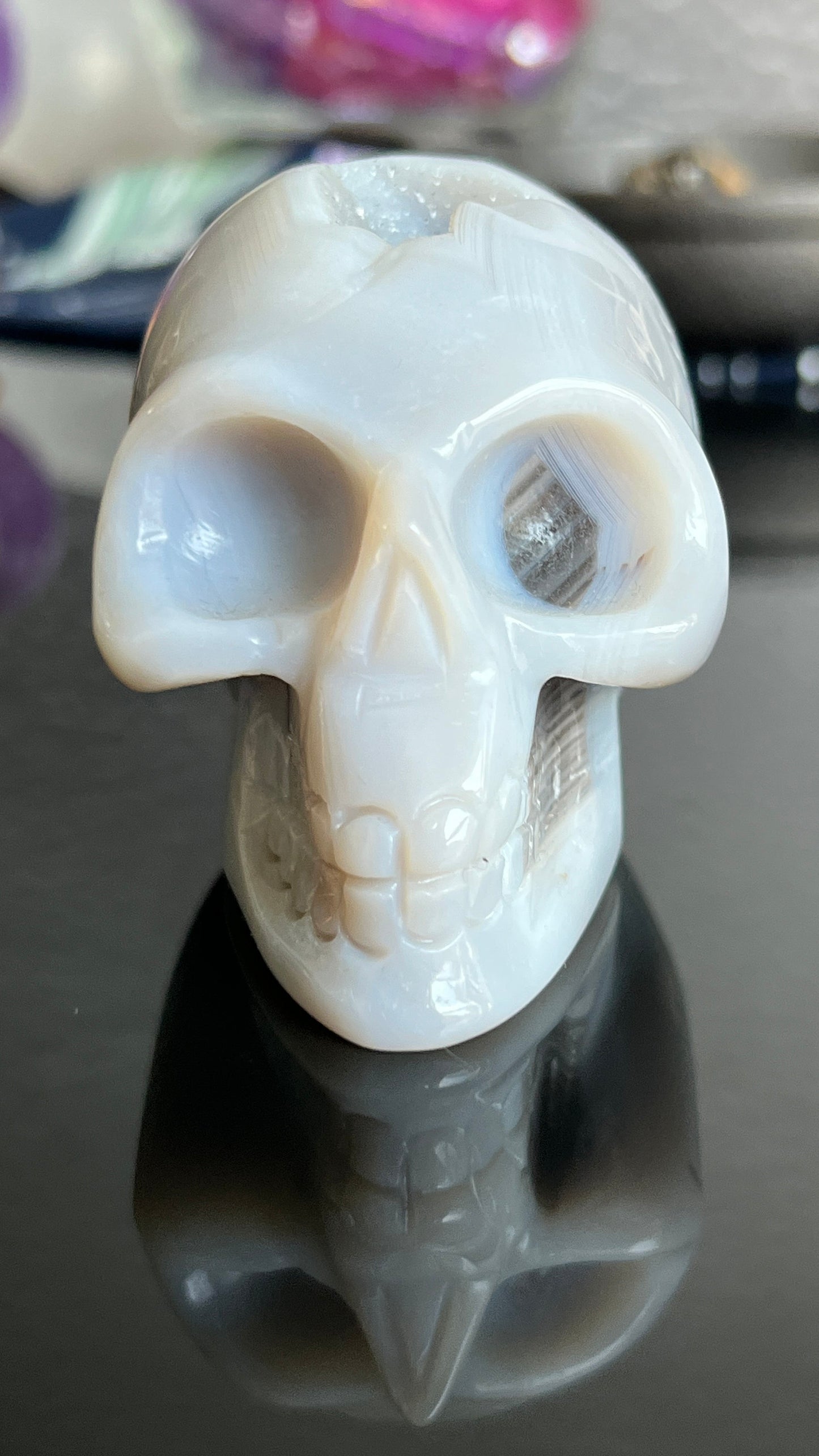 Druzy Banded Agate Skull 2 1/4 inches tall, weighing 9.1 ounces