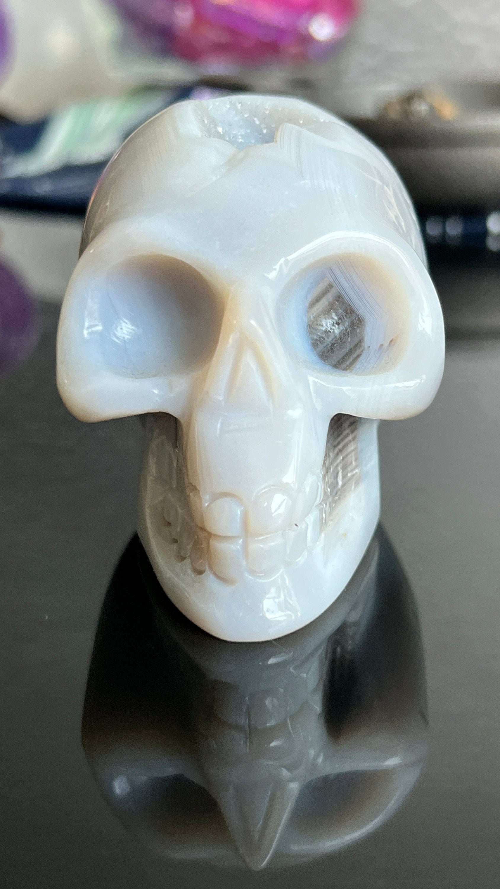 Druzy Banded Agate Skull 2 1/4 inches tall, weighing 9.1 ounces
