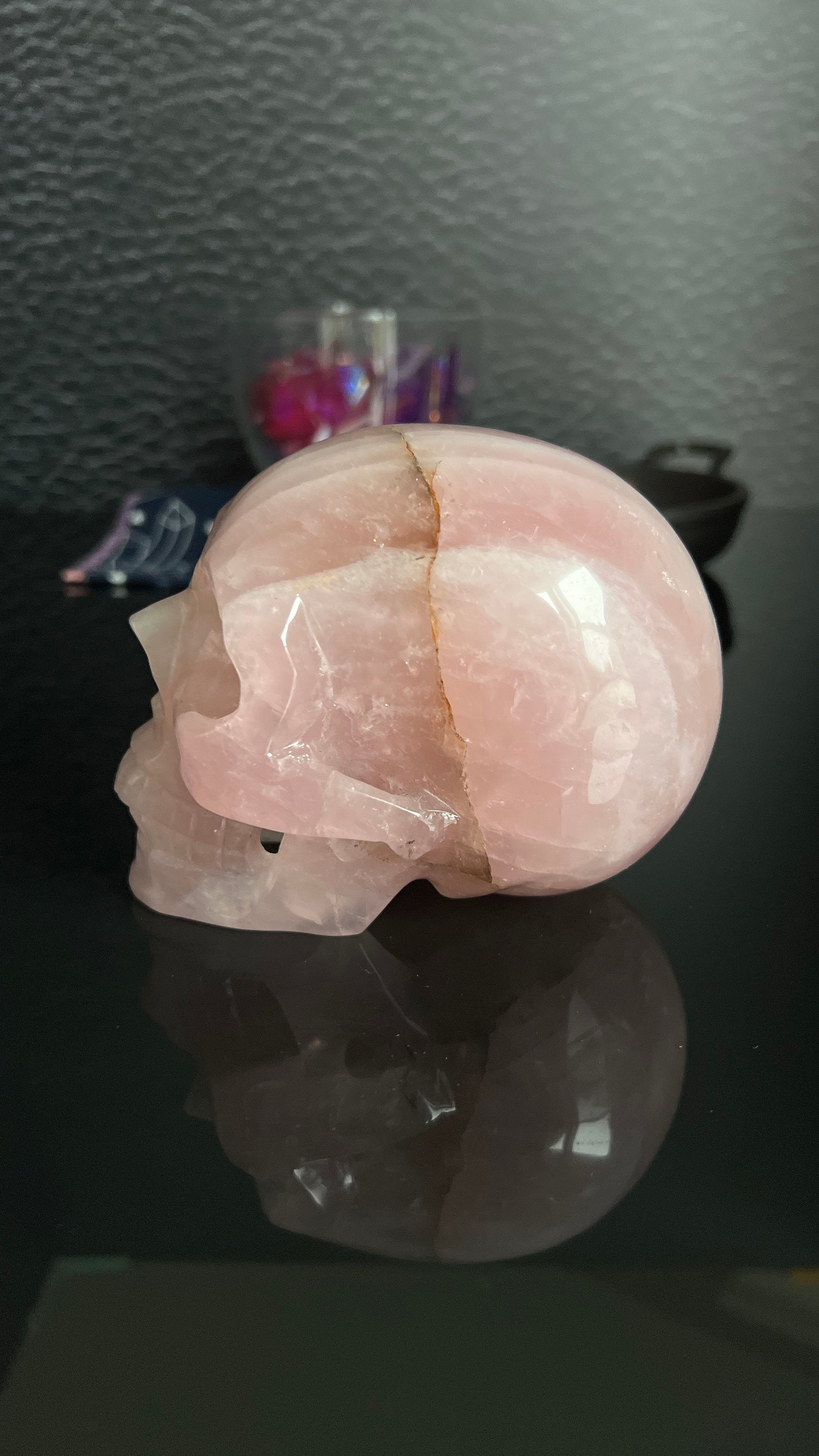 Beautiful Rose Quartz Skull. Approx 4 inches tall and 4 1/2 inches long. Weighs 2.6 pounds